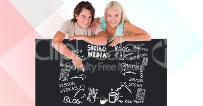 Young man and woman leaning on bill board with social media text and icons