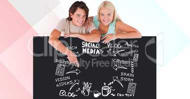 Young man and woman leaning on bill board with social media text and icons