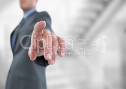 Midsection of businessman pointing