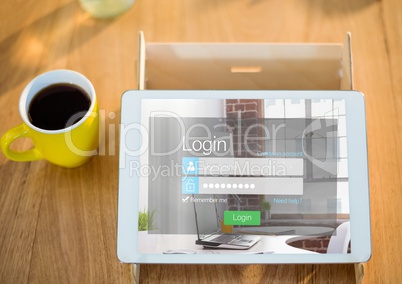 tablet with login screen in a table with a coffee
