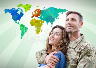 Army couple in front of Colorful Map