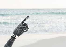 Android Robot hand pointing with sea background