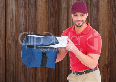 Pizza deliveryman with the delivery bag and pizza boxes. Wood background