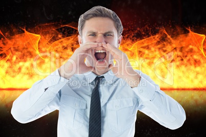Digital composite image of angry businessman screaming against fire