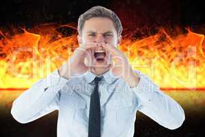 Digital composite image of angry businessman screaming against fire
