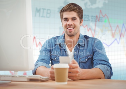 Man at computer with coffee against blue graph