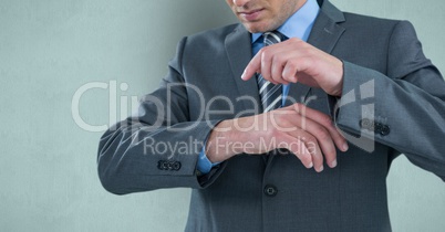 Midsection of businessman pointing on hand