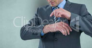 Midsection of businessman pointing on hand