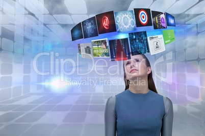 Composite image of woman and 3d items