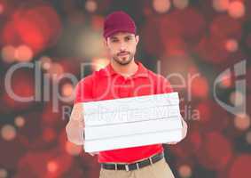 Deliveryman with pizza boxes. Red ;lights bakground
