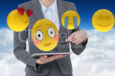 Composite image of happy woman with smileys