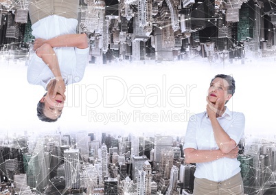 up side down city. woman thinking