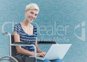 Woman in wheelchair against blue emoji pattern