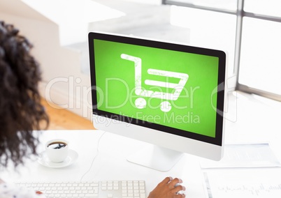 Person using Computer with Shopping trolley icon