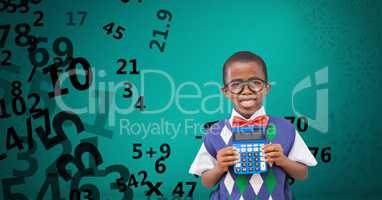 Happy school boy holding calculator against flying numbers