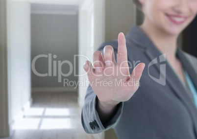 Woman touching air with hall background