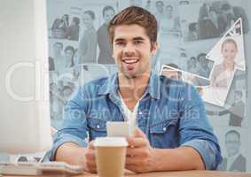 Man at computer with coffee against images of business people and arrow