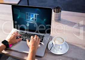 Person using Laptop with Shopping trolley icon
