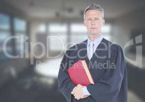 Judge holding book in front of office