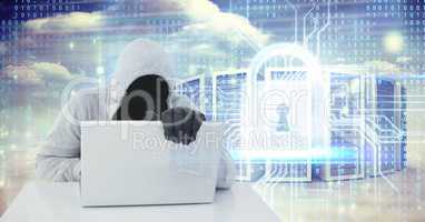 Digital composite image of hacker using laptop by lock and servers on screen