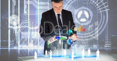 Digitally generated image of businessman analyzing graphs with employees on table