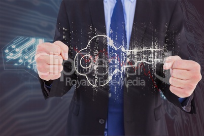 Digital composite image of businessman with key