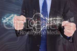Digital composite image of businessman with key