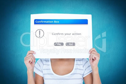 Woman holding confirmation box sign in front of face