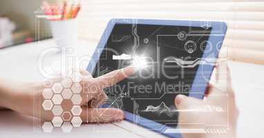 Hands with tablet and white interface with flare