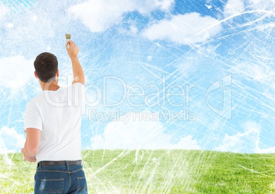 Man painting blue sky clouds