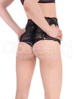 Woman's butt in black lingerie.