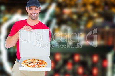 Composite image of smiling man with pizza