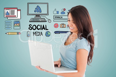 Digitally generated image of woman using laptop with various icons on blue background