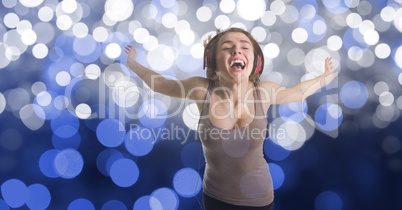 Happy music artist over bokeh