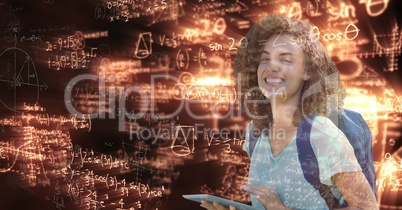 Digitally generated image of female college student with digital tablet looking at glowing math equa