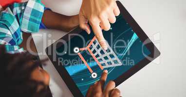 Hands touching shopping cart icons on tablet computer