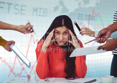 Hands with devices surrounding stressed woman against blue graph