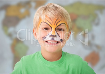 Boy with facepaint against blurry map