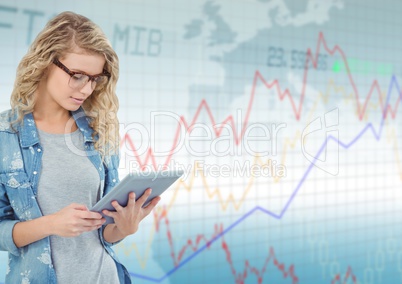 Woman with tablet against blue graph