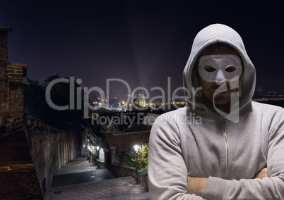 Anonymous Criminal in hood on street