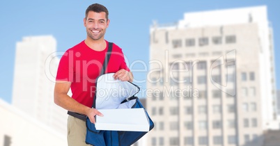 Portrait of smiling man with bag delivering pizza
