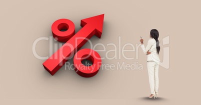Businesswoman looking at percentage sign in arrow shape