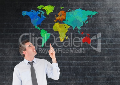 Man pointing at Colorful Map with wall background