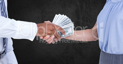 Cropped image of business people holding money representing corruption concept