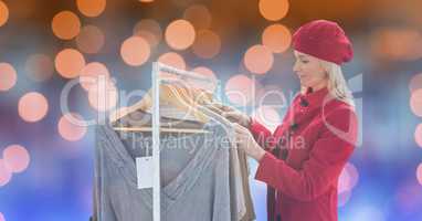 Woman in warm clothes shopping at store