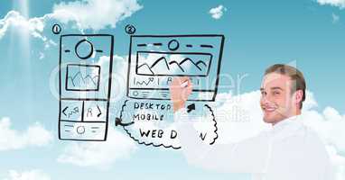 Businessman drawing mock ups of website in sky