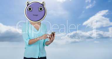 Digital composite image of woman face covered with emoji using phone in sky