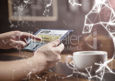 Hands in cafe with tablet and white network overlay