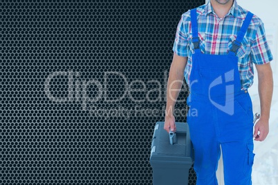 Composite image of man holding a toolbox