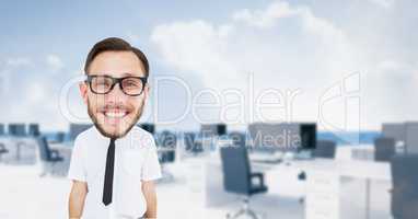 Digital composite image of nerd businessman in office